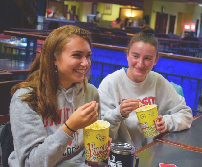 Students eating popcorn in Union