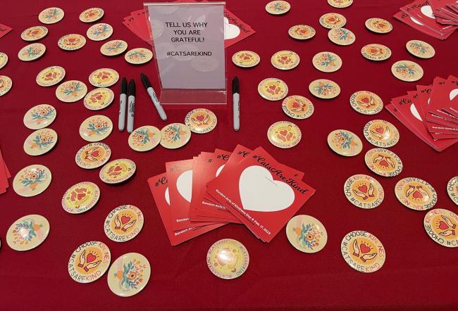 Random Acts of Kindness Buttons on table