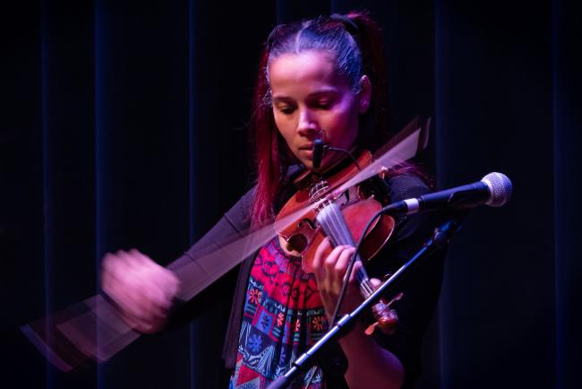 Rhiannon Giddens plays fiddle