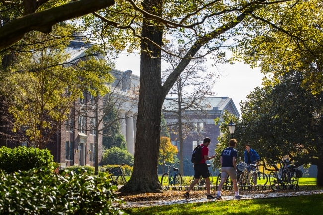 Two students walking on campus