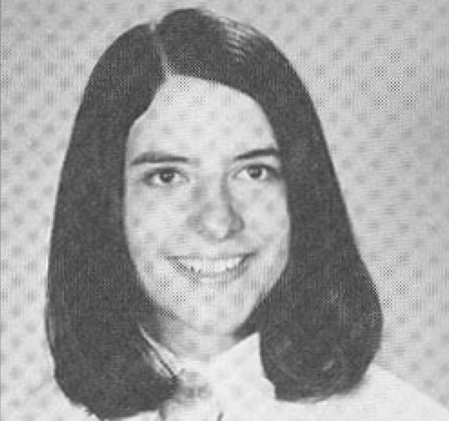 Black and white headshot of a woman