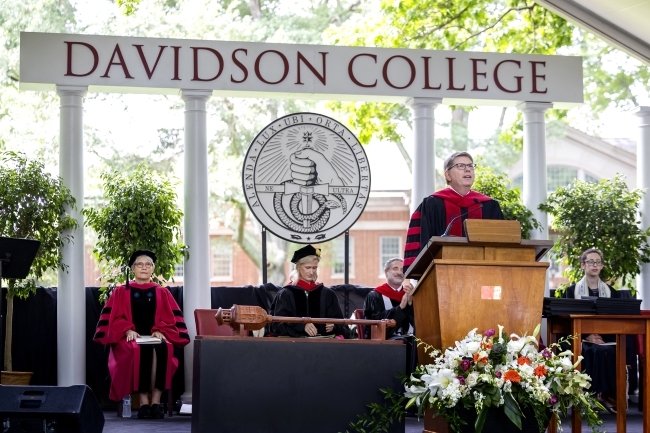 President Hicks addresses the crowd at graduation