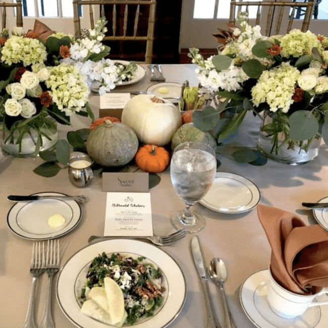 Much Ado Catering Table with Gourds, Salad and glasses