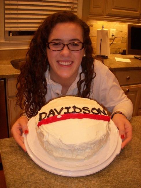 Julia Watkins ’14 with Davidson College Cake