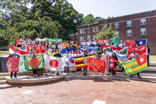 Davidson College International Students Hold Country Flags