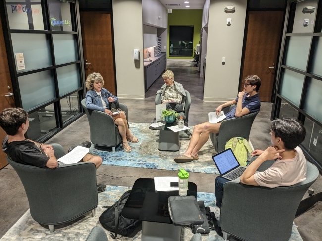 Small group discussion on the impacts of social media including Pam Dykstra and Anthony Toumazatos ‘25