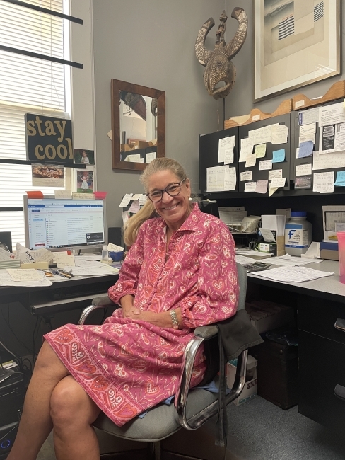 Ginny Newell at her desk