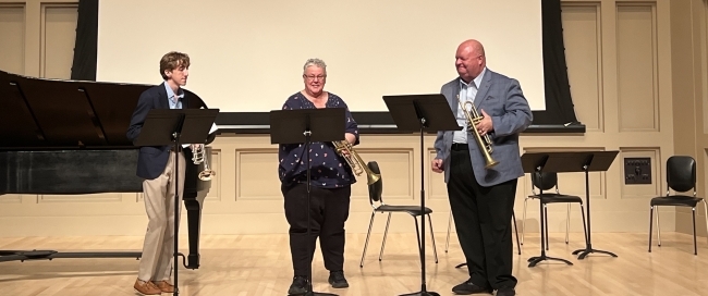 Gavin Daniel ’26 on stage at the North Carolina Music Teachers Association’s Young Composers Contest