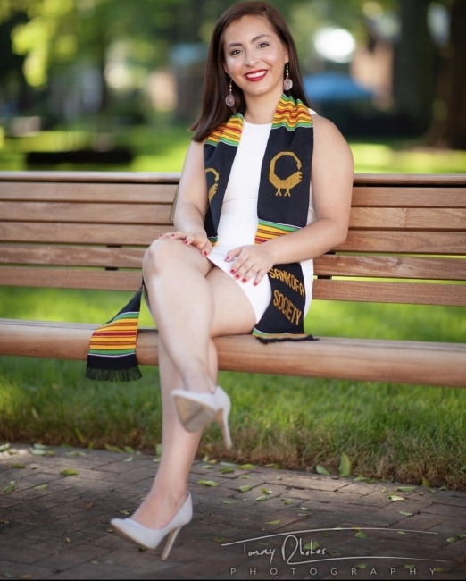 Itziri Gonzalez-Barcenas ’19 sitting on bench