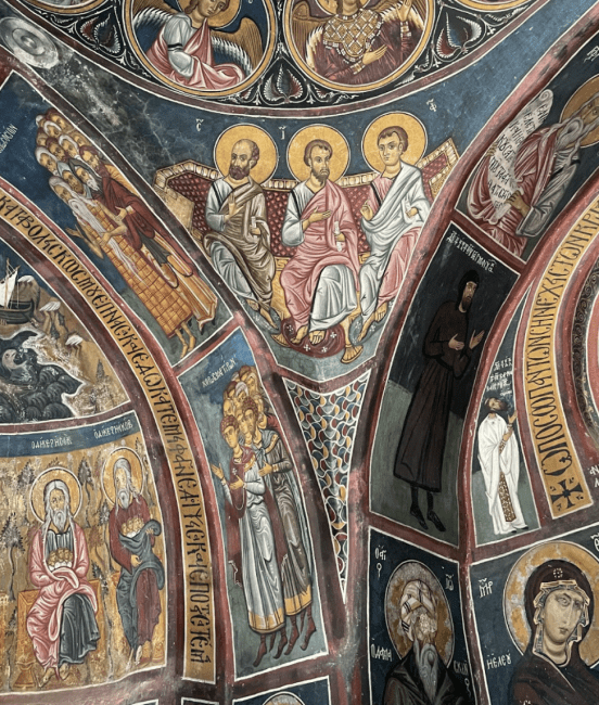 murals on a wall in a church