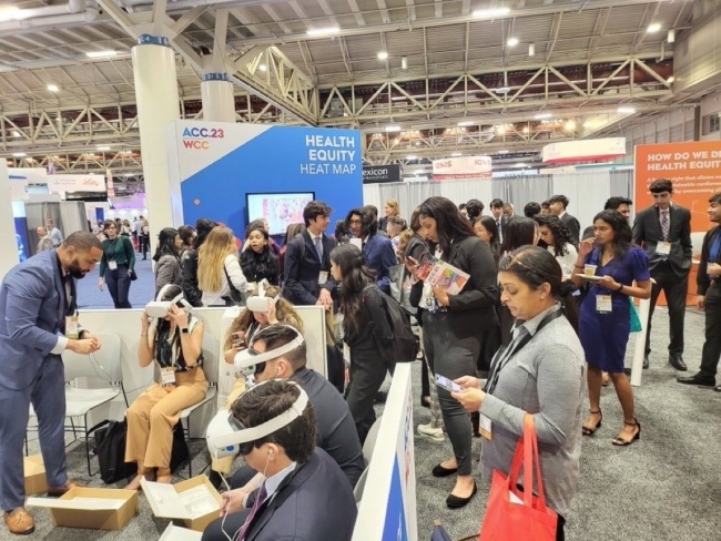 a group of people wearing VR headsets at a confernece