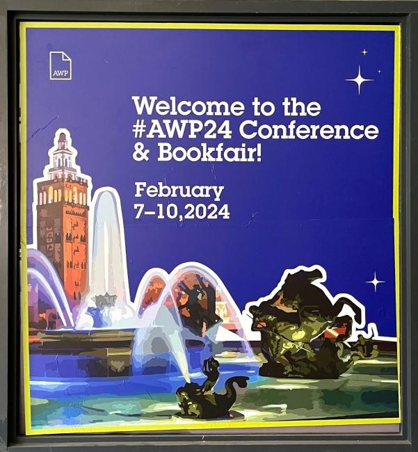 a sign reading "welcome to the AWP24 Conference & Bookfair!"