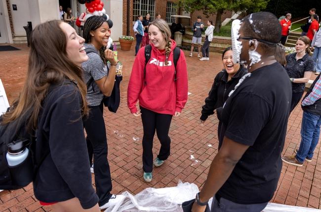Student laughing during Pie throwing contest for All in for Davidson 2024