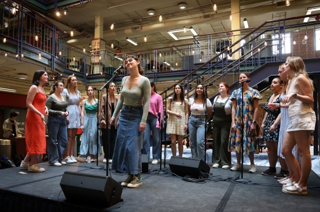 a group of young people singing