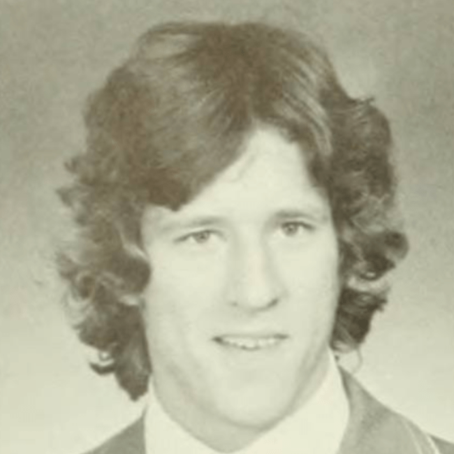 a young white man in a black and white yearbook photo