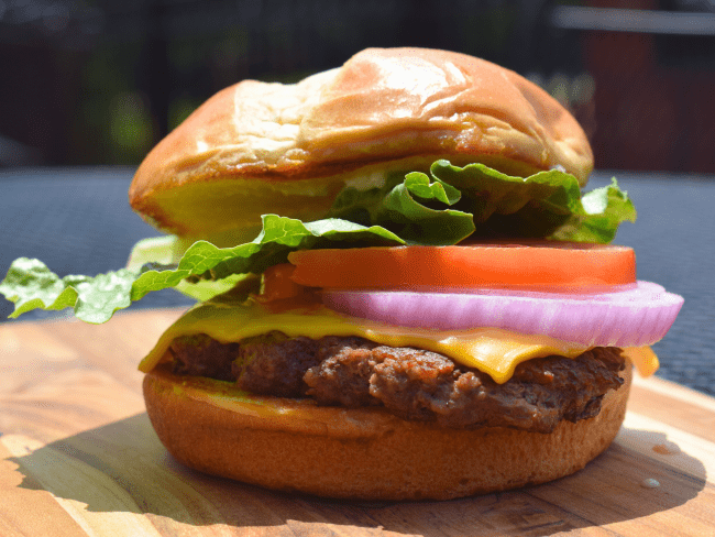 Davis Cafe Hamburger with cheese lettuce tomato and onion