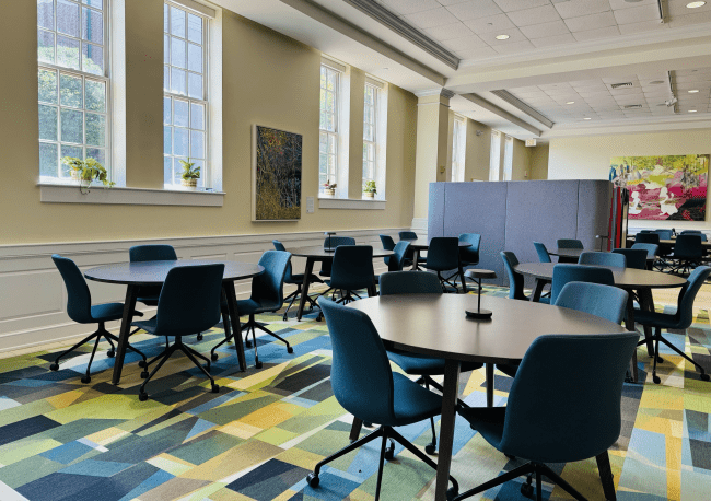 Tables and chairs in the temporarily Library in Lilly Gallery
