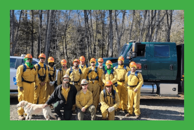 Incarcerated firefighters wearing yellow jumpsuits