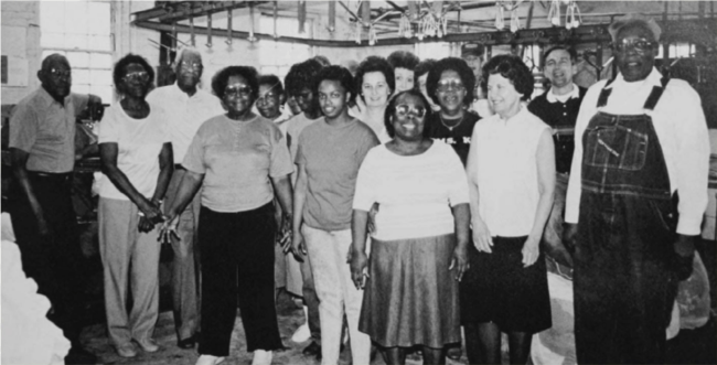 Black and white group photo of laundry staff