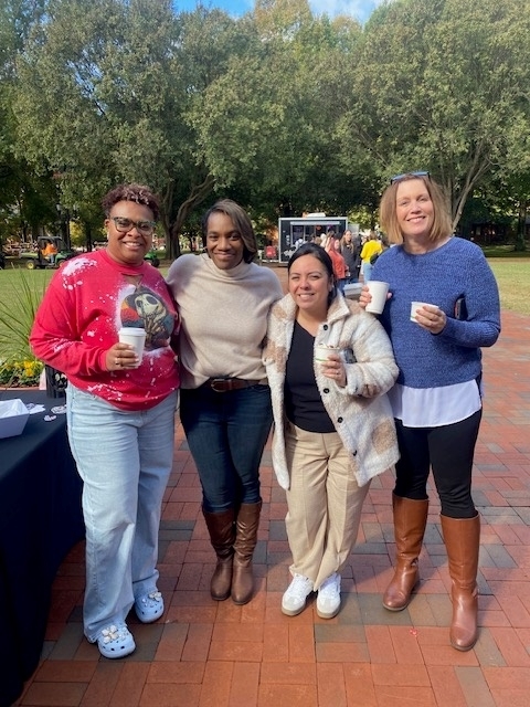 employees at Halloween event for staff council