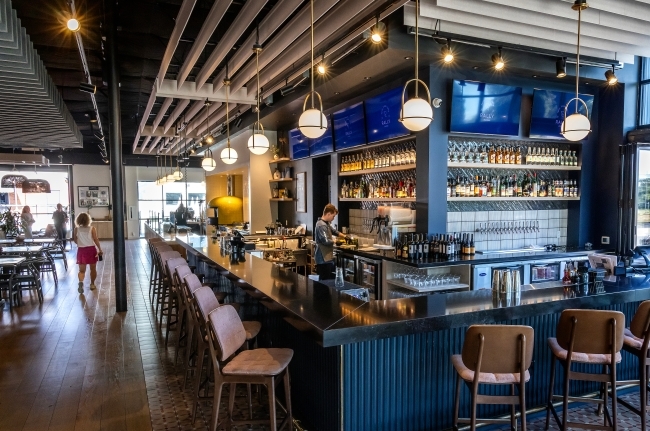 an upscale bar at an indoor pickleball facility