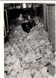 Biddle and her first-year roommate, the late Cathey Bost, in a dorm hall filled with wadded-up newspapers, Spring 1980