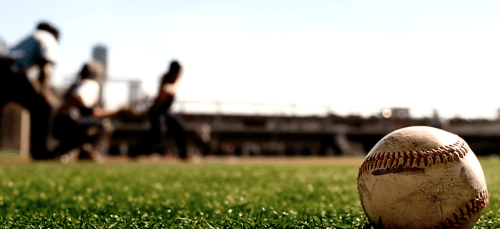 a baseball on a grassy diamond