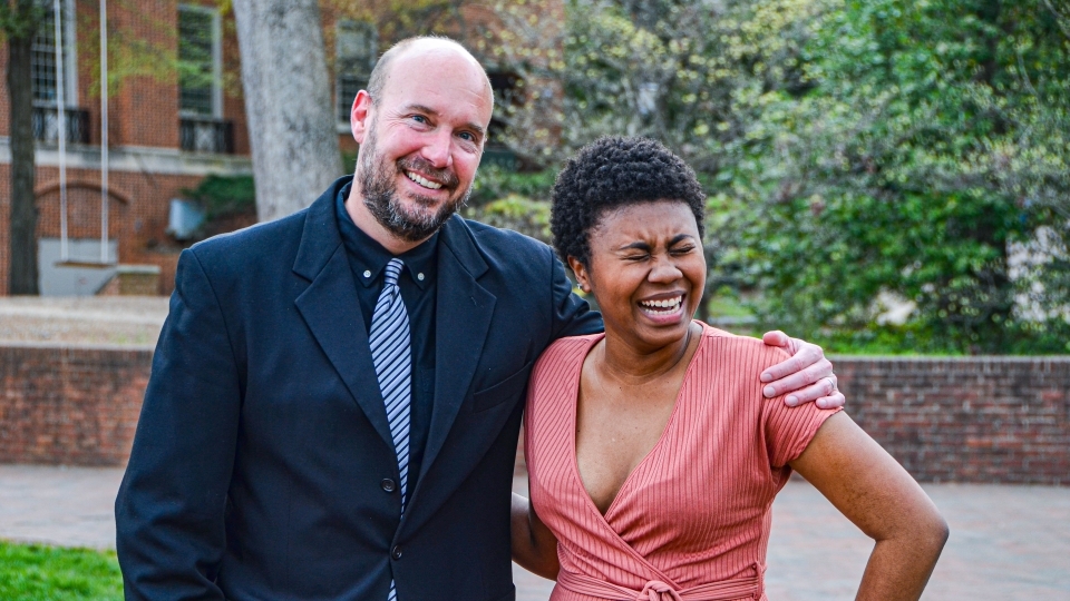 Kaya Carter laughing with Jason Ockert outdoors
