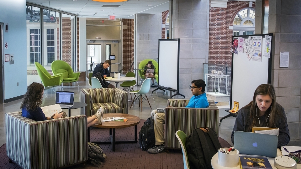Students studying in Wall academic building