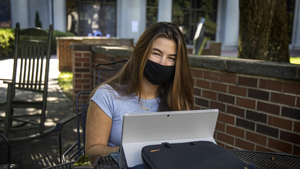 Student Studying Wearing Mask