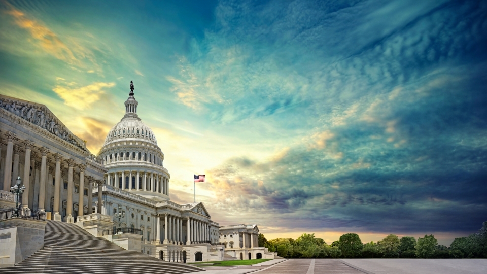 D.C. Capitol Building with radiant sunrise