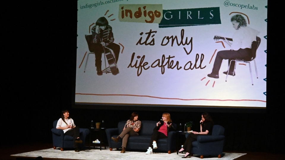 The Indigo Girls on stage at Davidson College 2024 with It's Only Life After All background