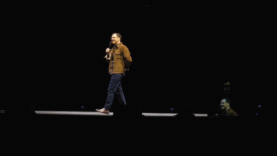 Joe Zimmerman on stage during standup routine