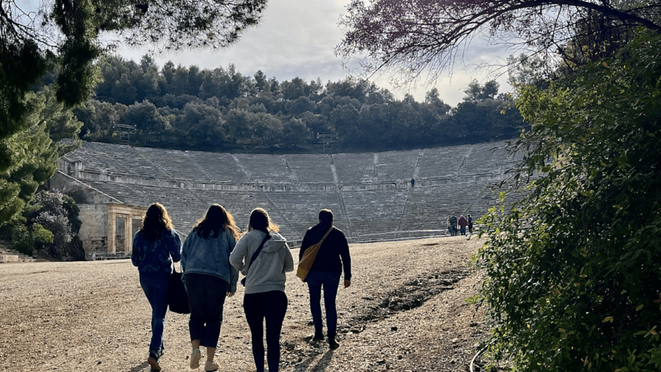 Davidson College students from thelasses 2024 and 2025 approach the Theatre at Epidaurus, Greece