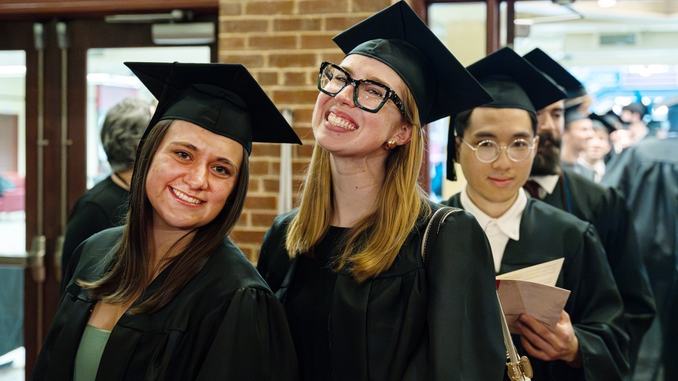 Convocation 2025 three students in cap and gown
