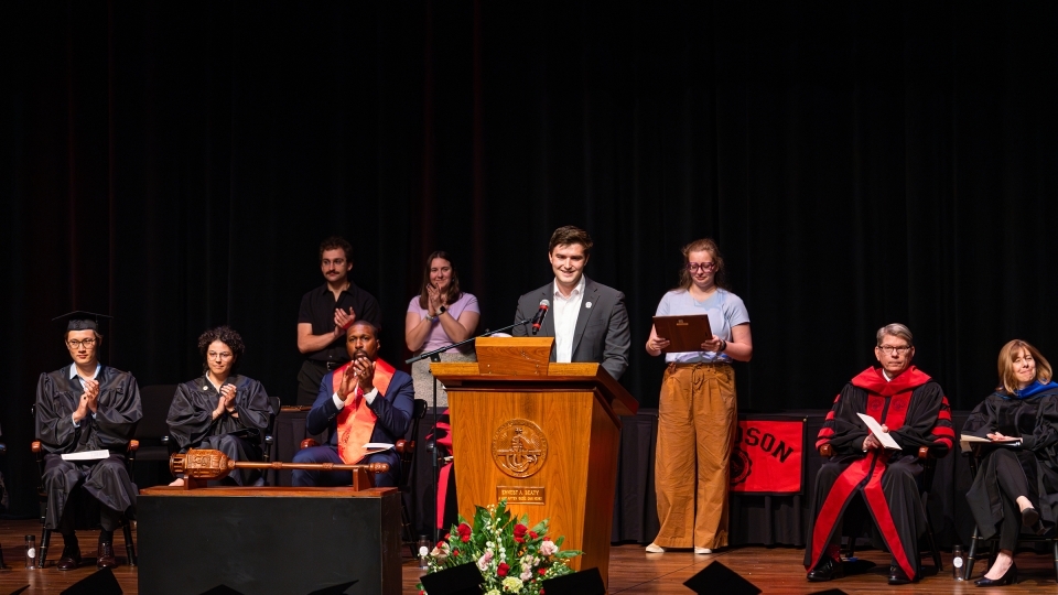 Convocation 2025 students, faculty and staff on stage 