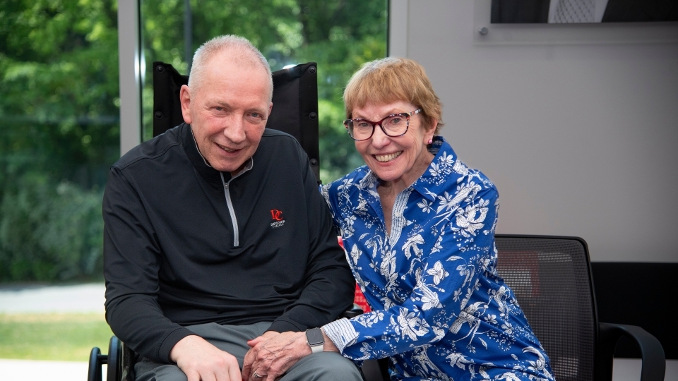 an older white man and his wife sitting together