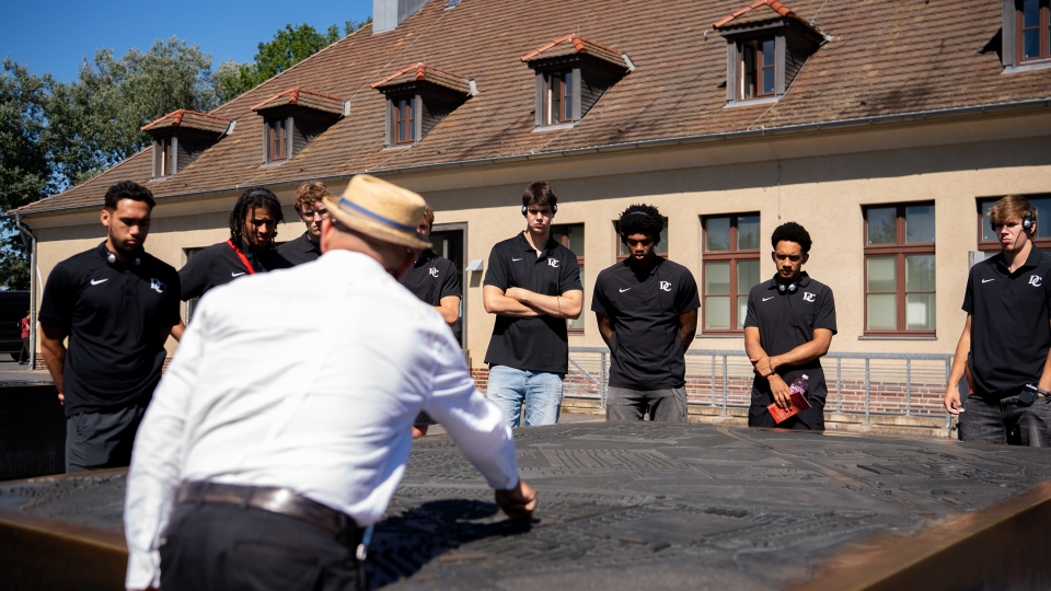 Davidson College Basketball team visits the Sachsenhausen concentration camp.