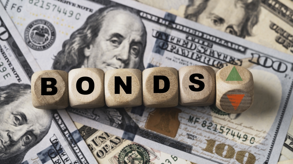 The word Bonds Getty Stock Image with American cash in the background