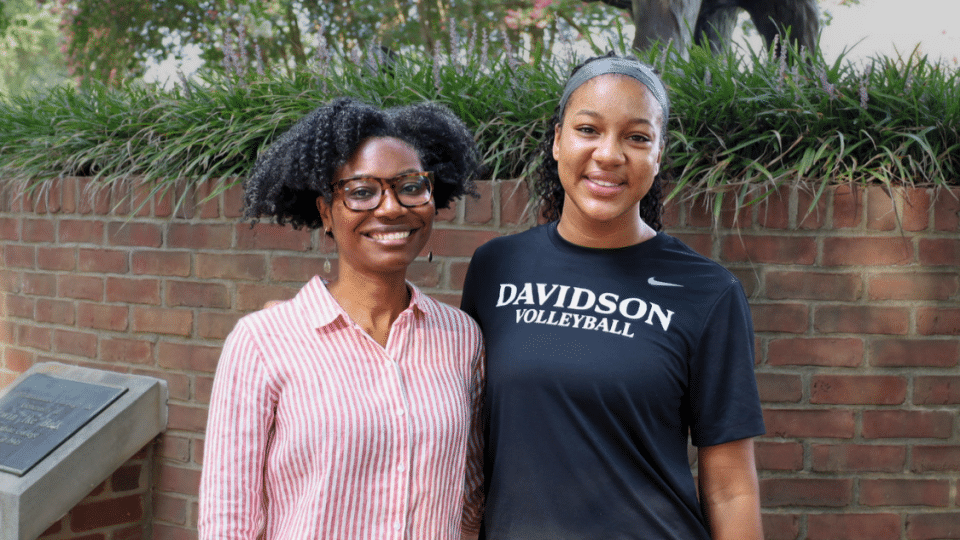 Whitney A. White ’08 and volleyball player Ariyana Johnson ’29