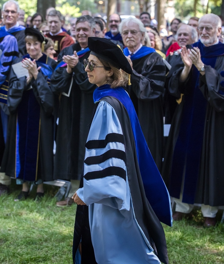 Rebecca Joubin approaches stage in regalia