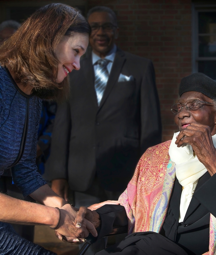 Carol Quillen and Lula Bell Houston Shake Hands