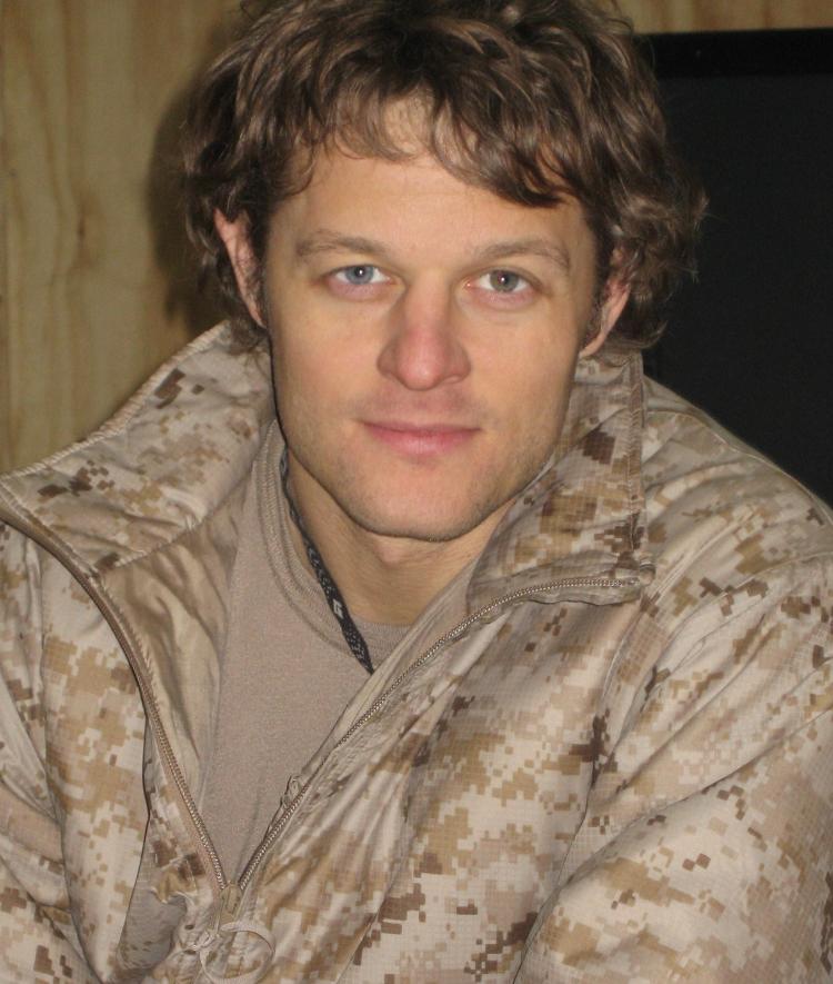 Joshua Harris '94 wearing camouflaged clothing