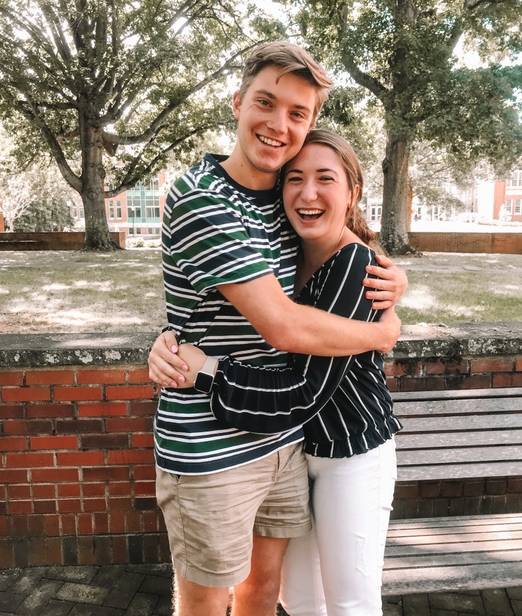 Jonathan Lee and Mara Papakostas hugging 