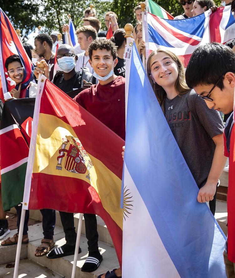 International Students Holding Flags