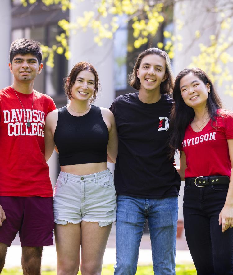 Students in Davidson shirts smiling