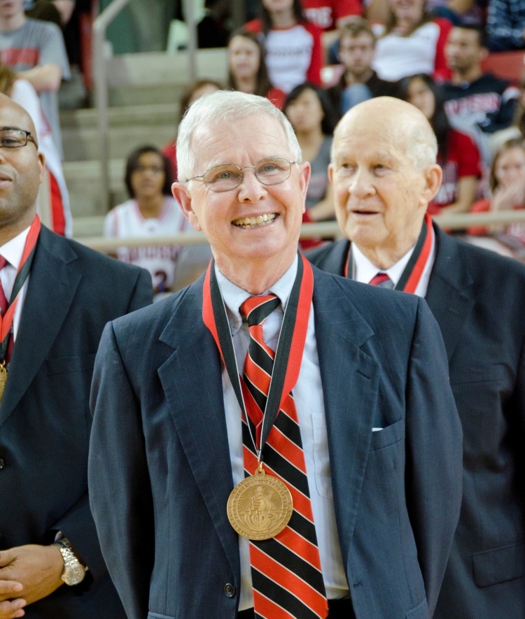 man with hall of fame medal around