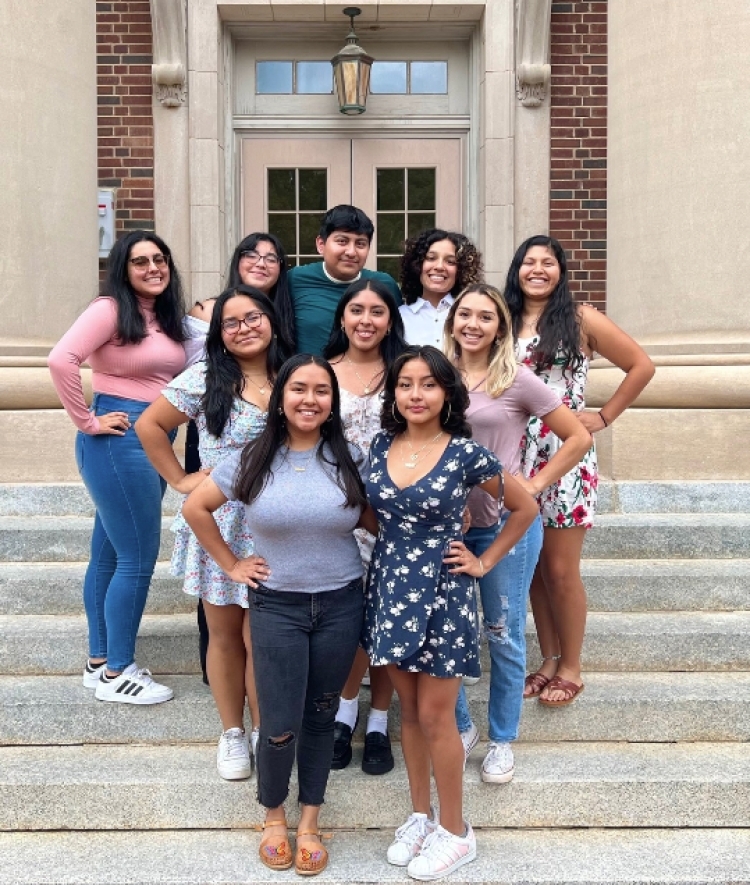 group of students standing on steps