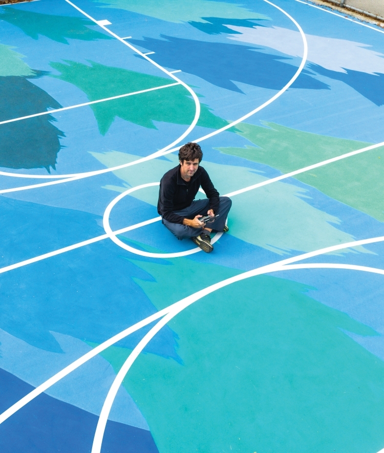 Austin Bell self portrait on a basketball court