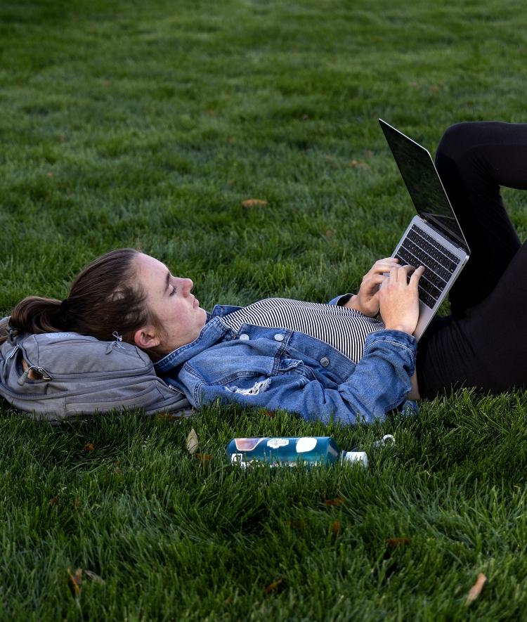 Student on Laptop Outdoors